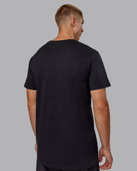 Man wearing Base FLXCotton Tee - Black | Model:Tom | Size:L