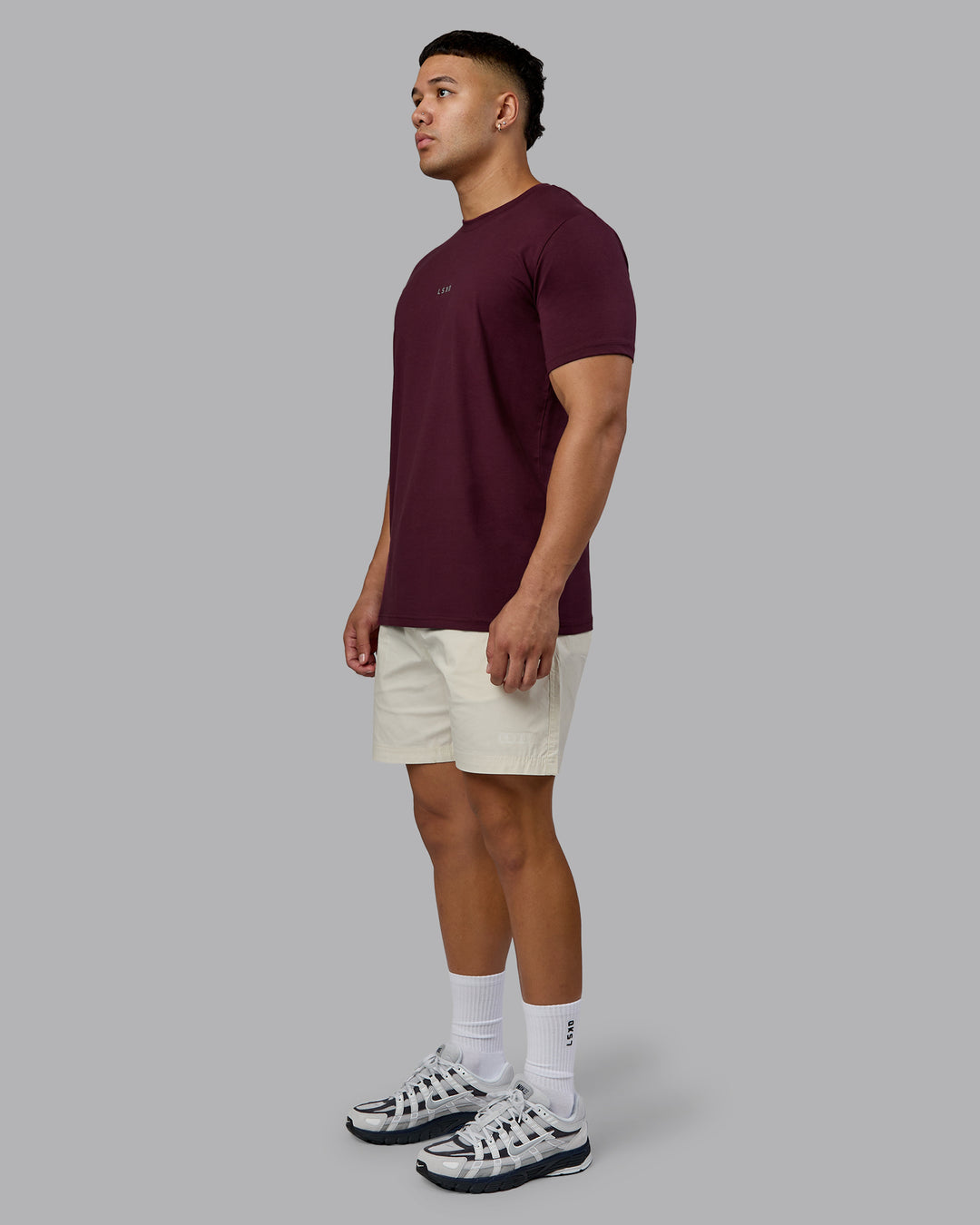Man wearing Base FLXCotton Tee - Cherry Lacquer | Model:Kaelyb | Size:L