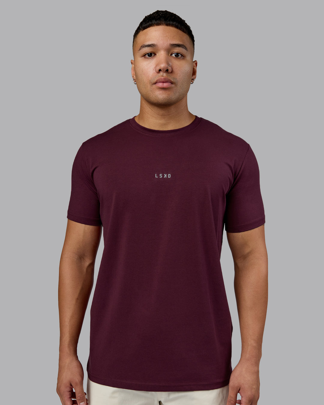 Man wearing Base FLXCotton Tee - Cherry Lacquer | Model:Kaelyb | Size:L