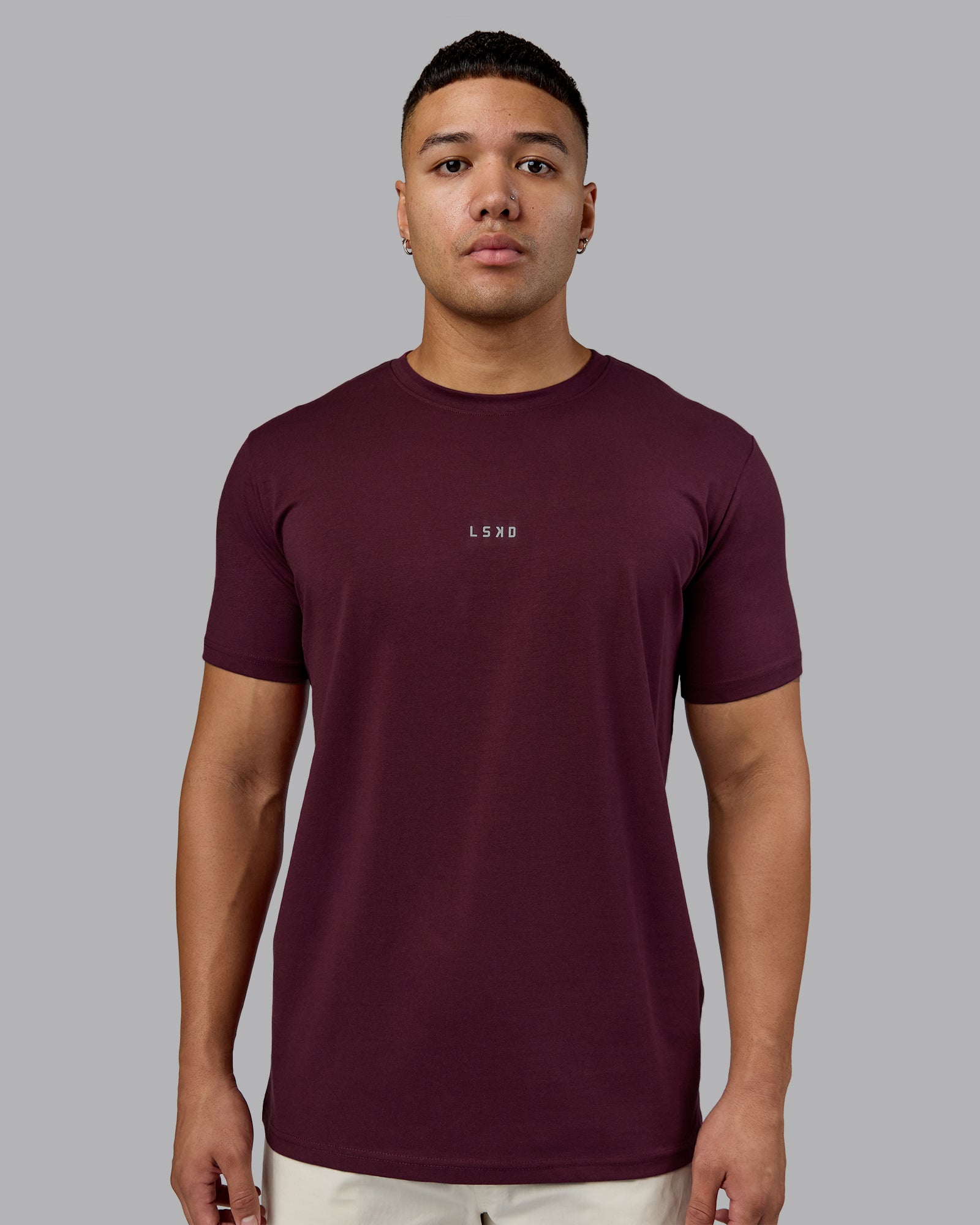 Man wearing Base FLXCotton Tee - Cherry Lacquer | Model:Kaelyb | Size:L