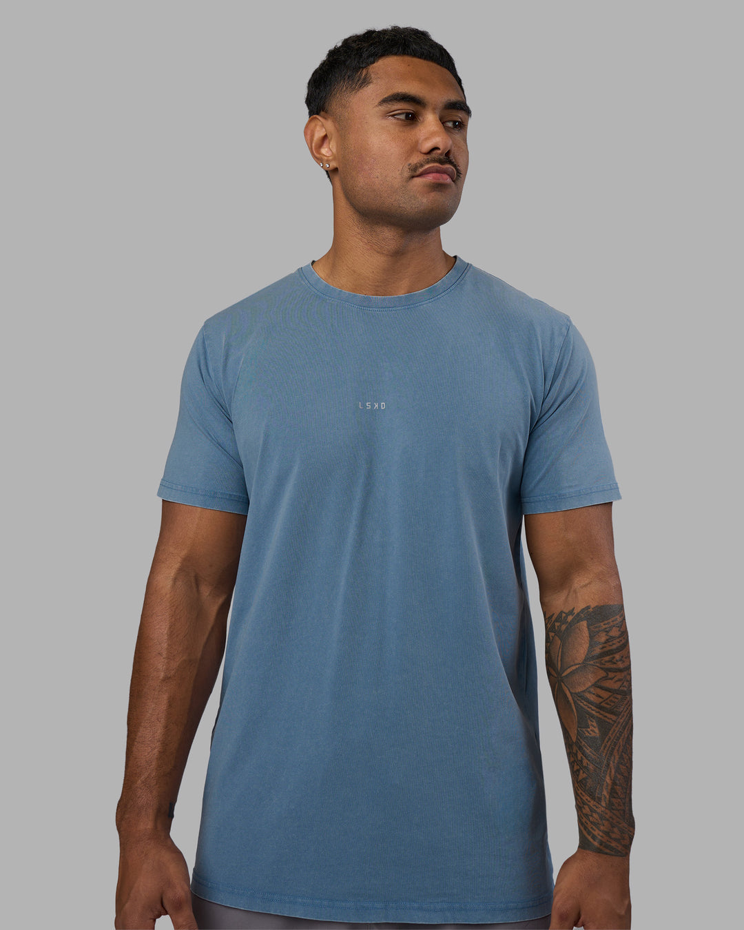 Man wearing Base FLXCotton Tee - Elemental Blue Washed | Model:Xav | Size:L