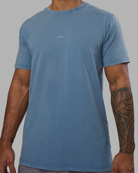 Man wearing Base FLXCotton Tee - Elemental Blue Washed | Model:Xav | Size:L