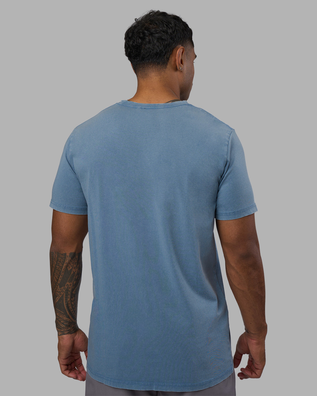 Man wearing Base FLXCotton Tee - Elemental Blue Washed | Model:Xav | Size:L