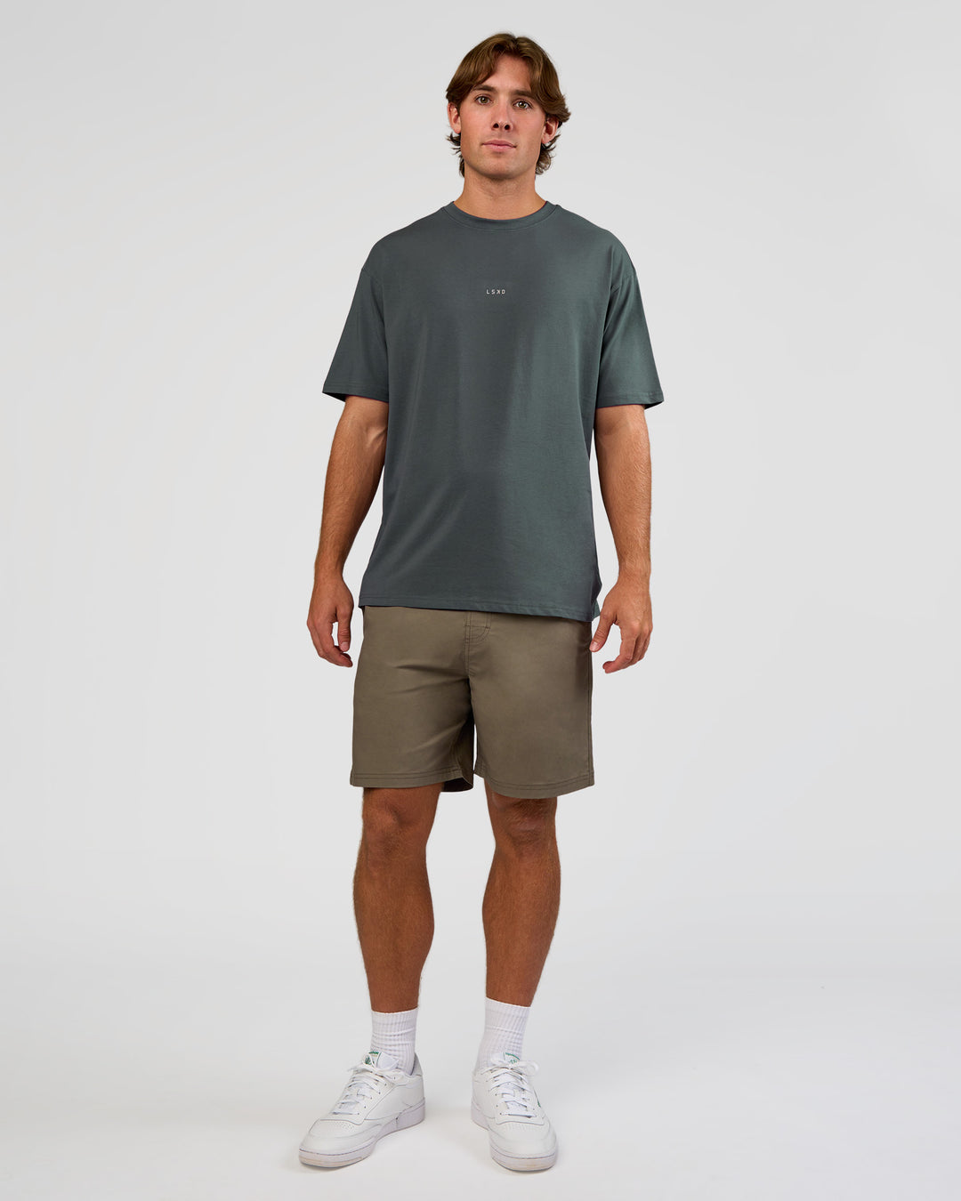 Man wearing Base FLXCotton Tee Oversized - Dark Slate | Model:Marcus | Size:L