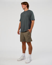 Man wearing Base FLXCotton Tee Oversized - Dark Slate | Model:Marcus | Size:L