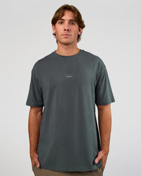 Man wearing Base FLXCotton Tee Oversized - Dark Slate | Model:Marcus | Size:L