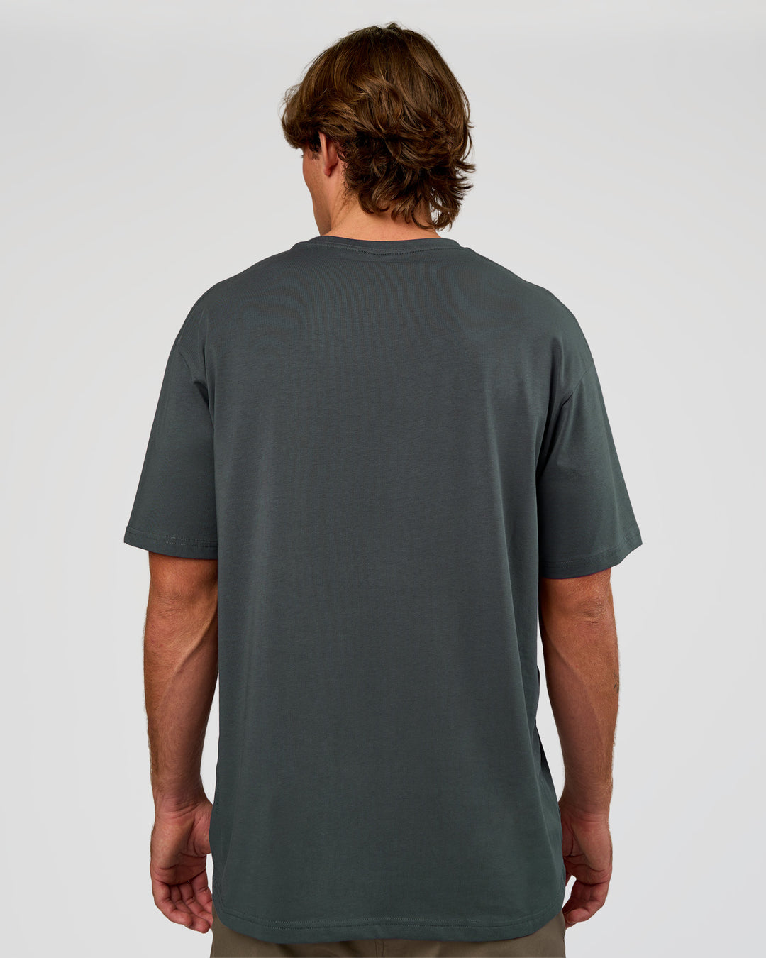 Man wearing Base FLXCotton Tee Oversized - Dark Slate | Model:Marcus | Size:L