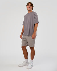 Man wearing Base FLXCotton Tee Oversized - Duskstone Washed | Model:Marcus | Size:L