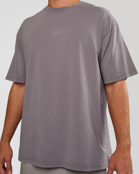 Man wearing Base FLXCotton Tee Oversized - Duskstone Washed | Model:Marcus | Size:L