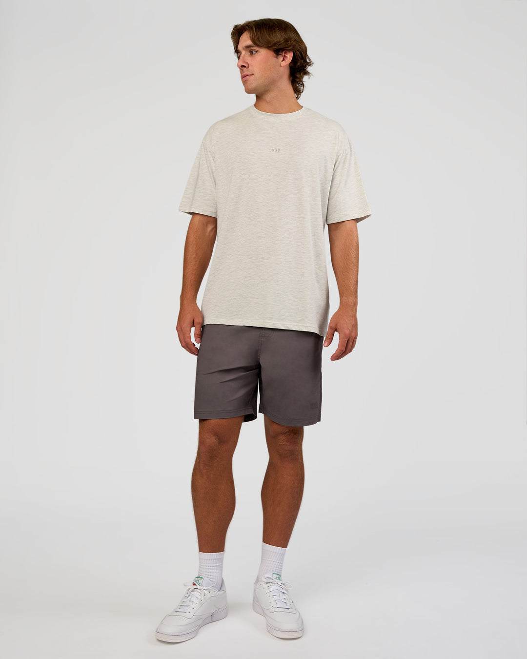 Man wearing Base FLXCotton Tee Oversized - Silver Marl | Model:Marcus | Size:L