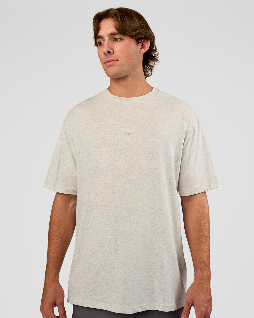 Man wearing Base FLXCotton Tee Oversized - Silver Marl | Model:Marcus | Size:L