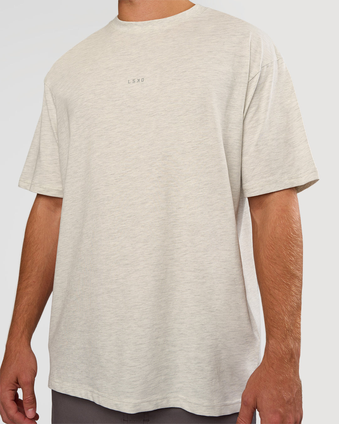 Man wearing Base FLXCotton Tee Oversized - Silver Marl | Model:Marcus | Size:L