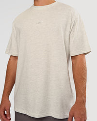 Man wearing Base FLXCotton Tee Oversized - Silver Marl | Model:Marcus | Size:L