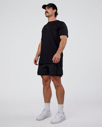 Man wearing Base FLXCotton Tee  Regular Fit +2cm - Black | Model:Adam | Size:L