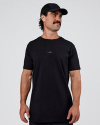 Man wearing Base FLXCotton Tee  Regular Fit +2cm - Black | Model:Adam | Size:L