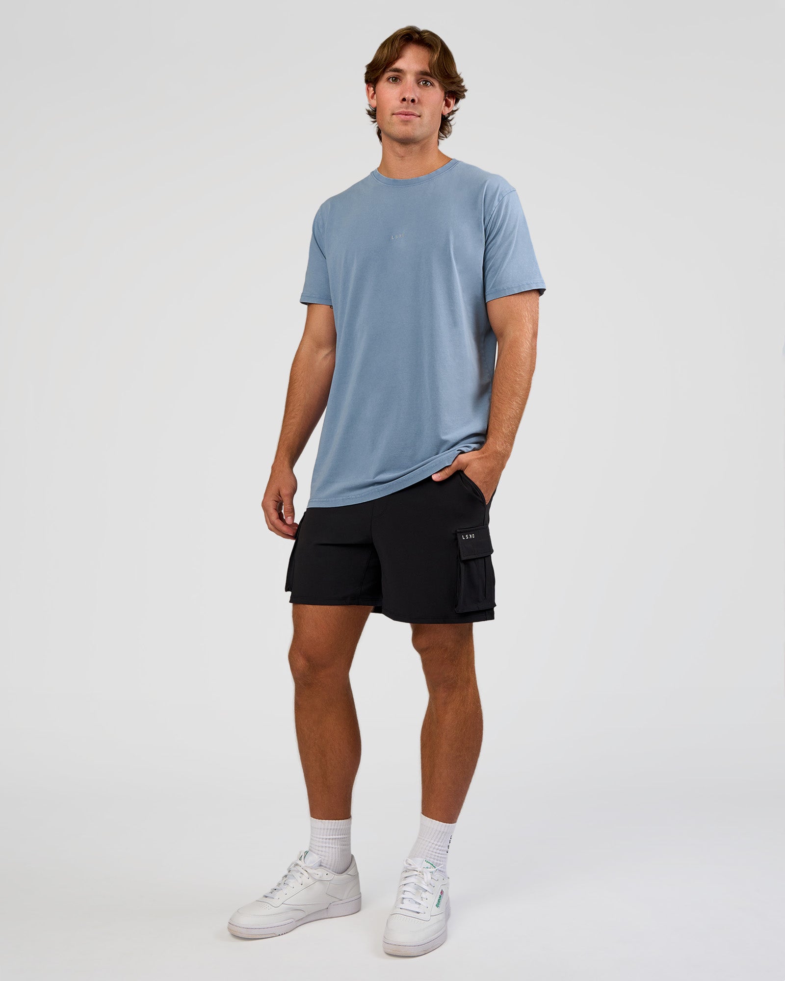 Man wearing Base FLXCotton Tee  Regular Fit +2cm - Elemental Blue Washed | Model:Marcus | Size:L