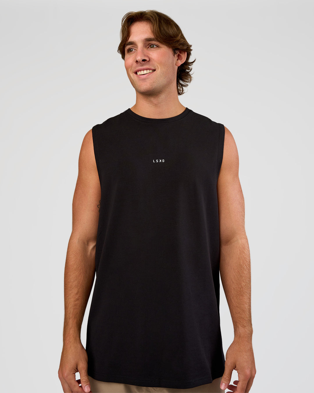Man wearing Base Heavyweight FLXCotton Tank Regular Fit +2cm - Black | Model:Marcus | Size:L