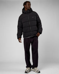 Man wearing Base Puffer Jacket - Black | Model:Okello | Size:L