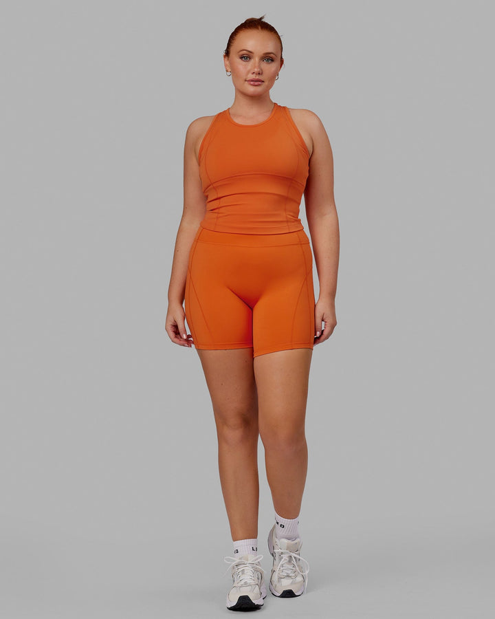 Woman wearing Bend Mid Short Tight - Burnt Orange