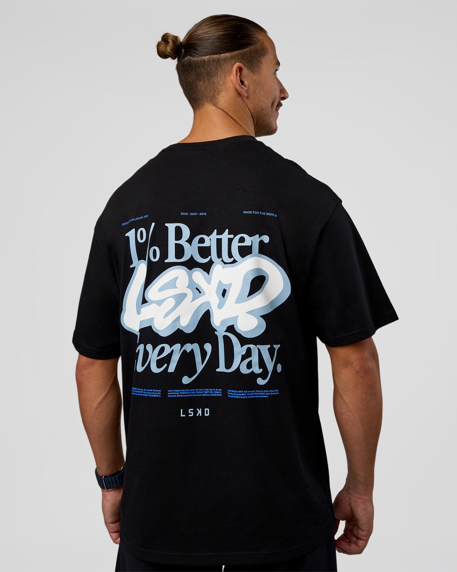 Man wearing Break Through FLXCotton Oversized Tee - Black-Open Air | Model:Jaiden | Size:L