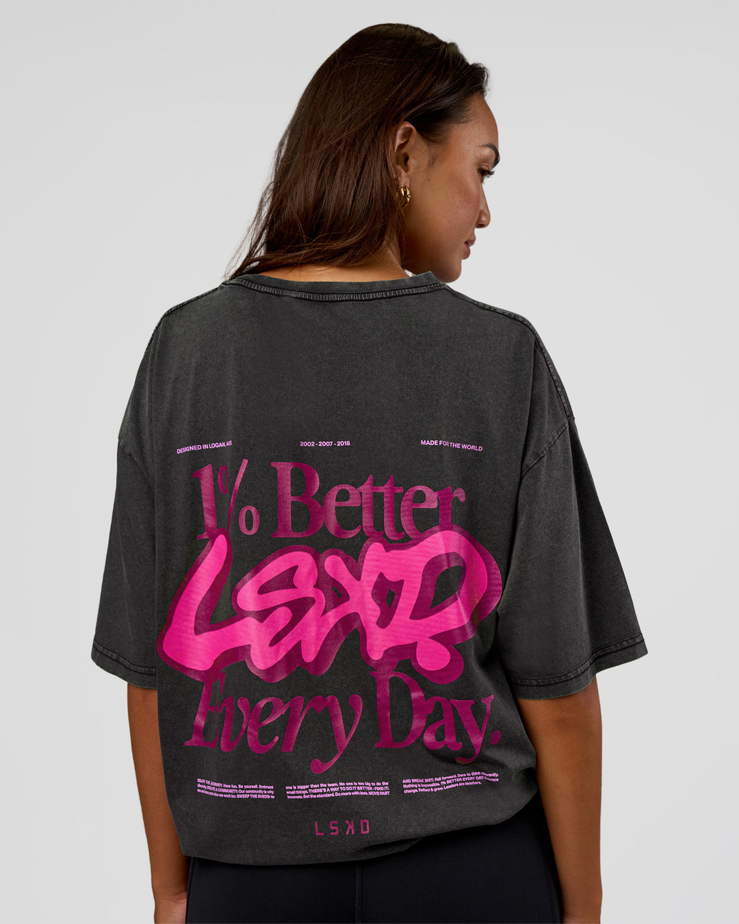 Woman wearing Break Through FLXCotton Oversized Tee - Black-Plum Caspia | Model:Kirstyn | Size:L