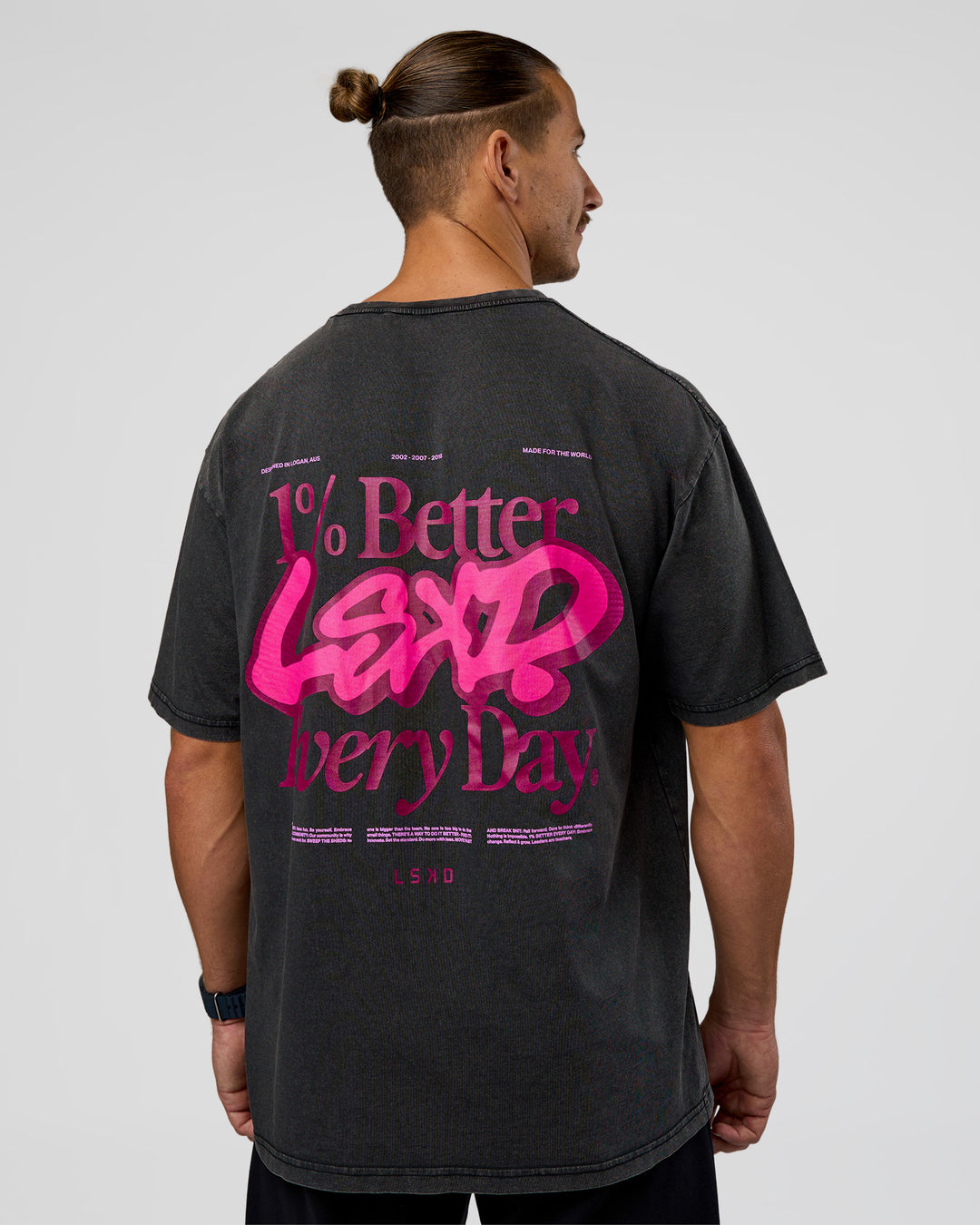 Man wearing Break Through FLXCotton Oversized Tee - Black-Plum Caspia | Model:Jaiden | Size:L