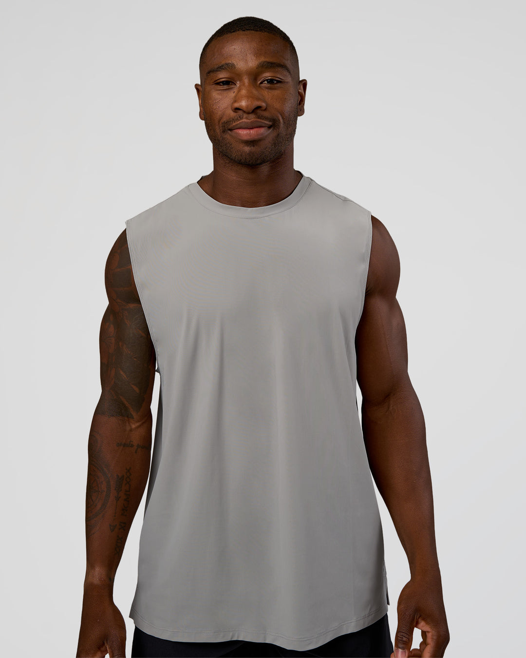 Man wearing Cadence MicroMotion Muscle Tank - Alloy | Model:Sam | Size:L