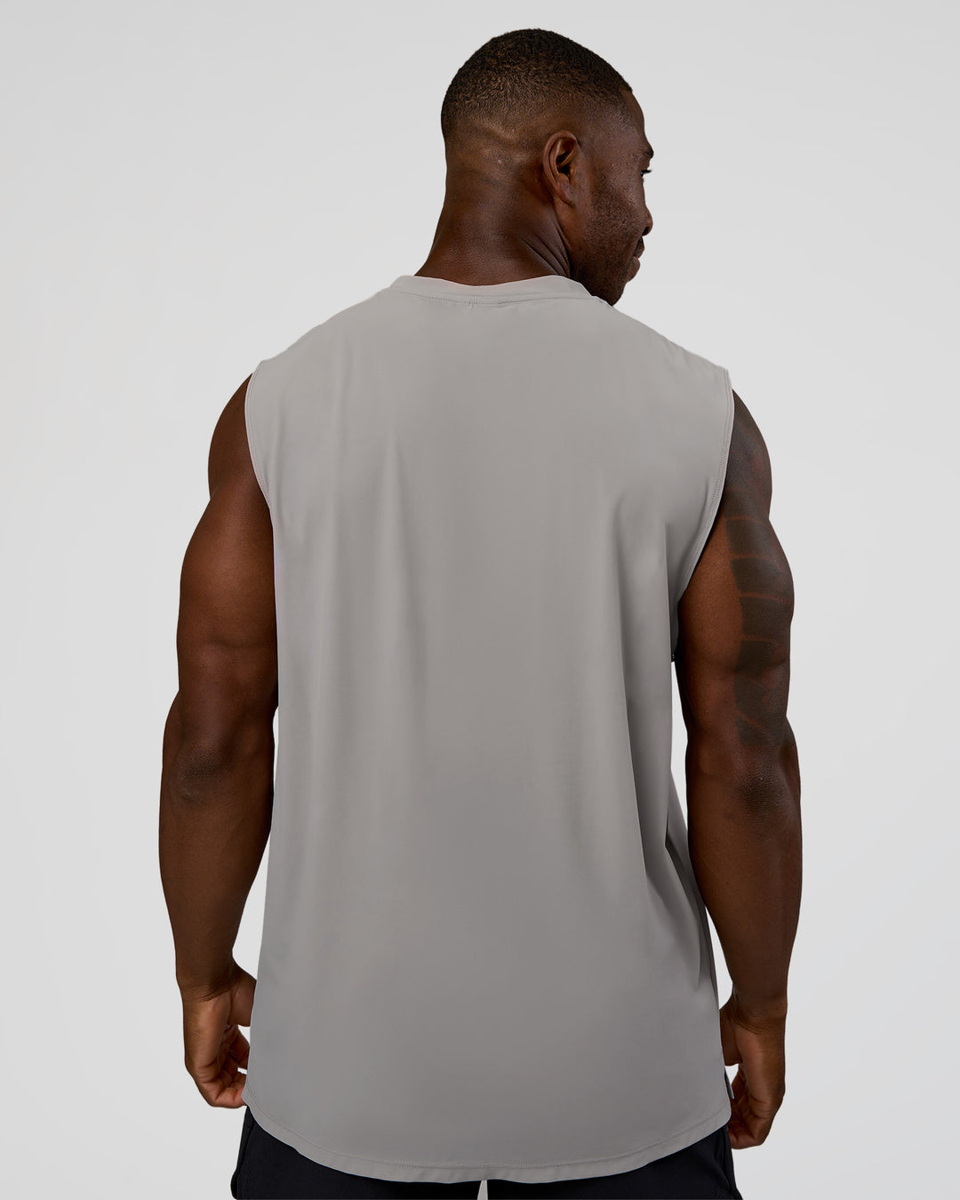 Man wearing Cadence MicroMotion Muscle Tank - Alloy | Model:Sam | Size:L