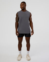 Man wearing Cadence MicroMotion Muscle Tank - Dark Storm | Model:Sam | Size:L