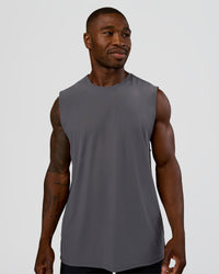 Man wearing Cadence MicroMotion Muscle Tank - Dark Storm | Model:Sam | Size:L