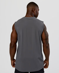 Man wearing Cadence MicroMotion Muscle Tank - Dark Storm | Model:Sam | Size:L