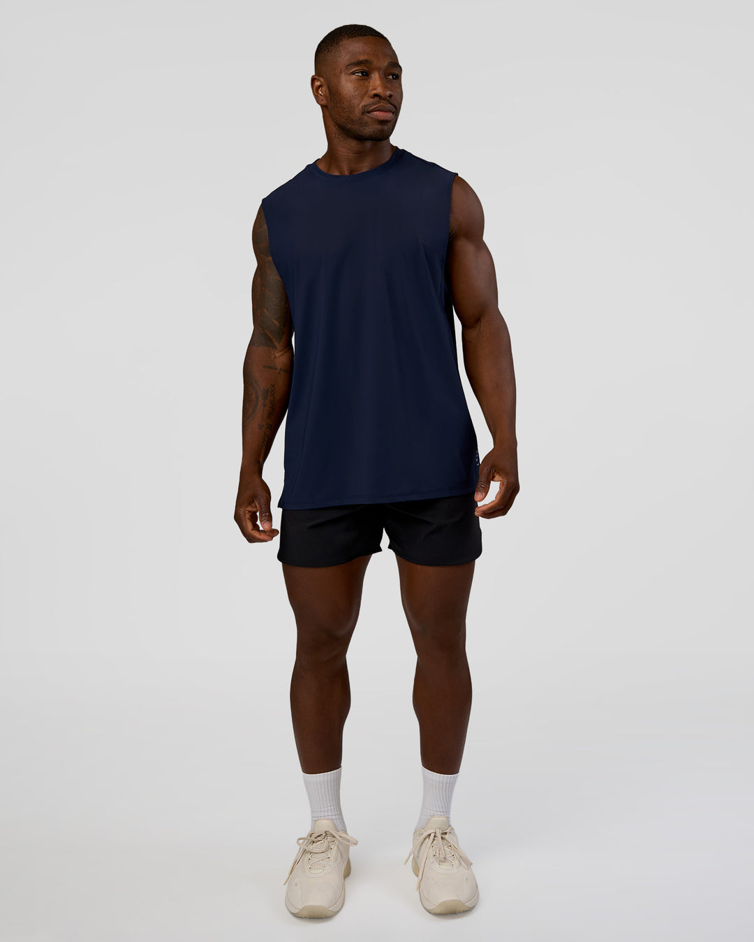 Man wearing Cadence MicroMotion Muscle Tank - Future Navy | Model:Sam | Size:L