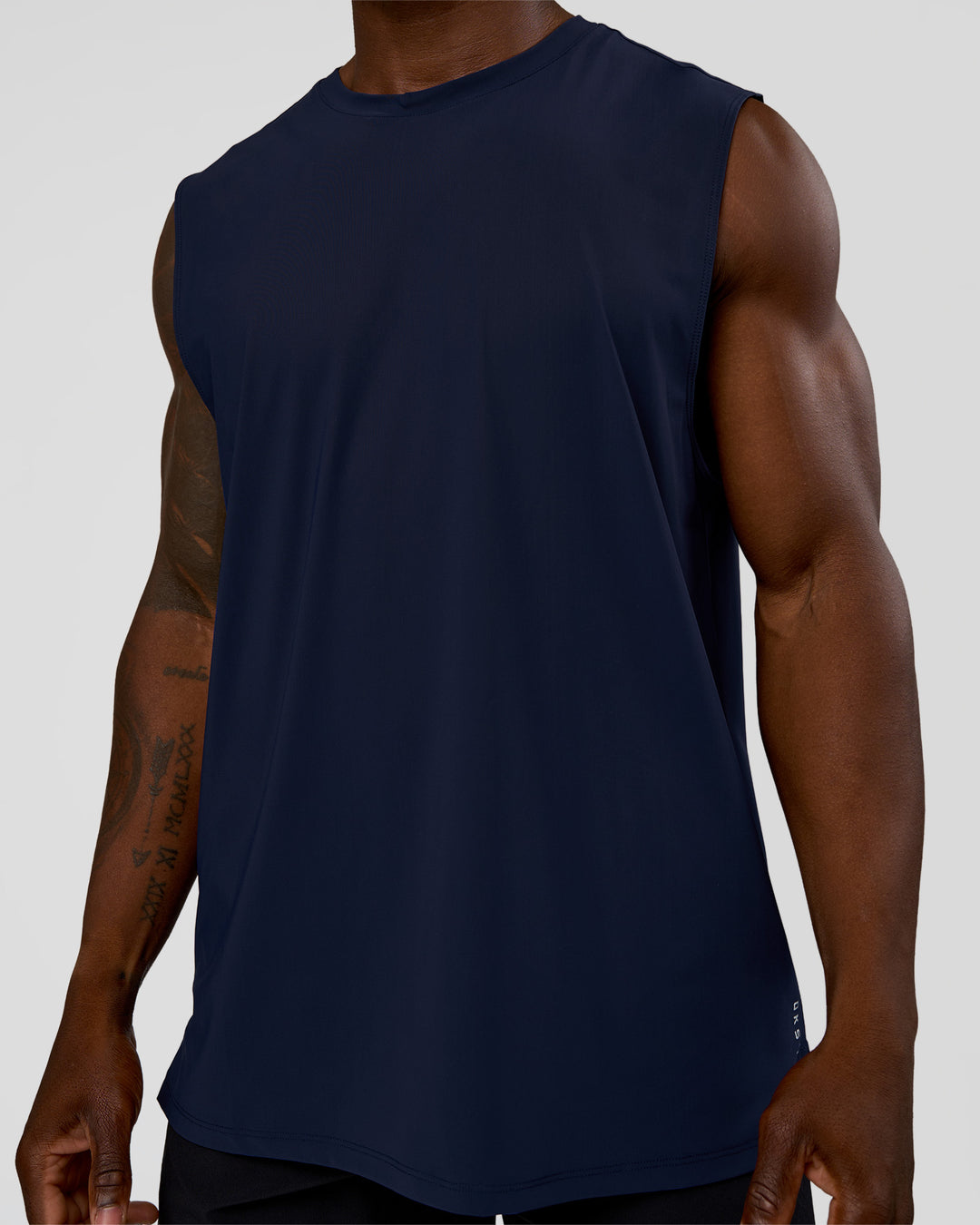 Man wearing Cadence MicroMotion Muscle Tank - Future Navy | Model:Sam | Size:L