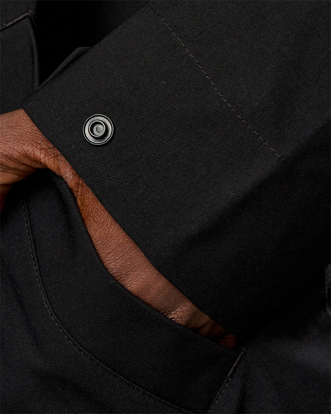 Man wearing Coaches Jacket - Black | Model:Okello | Size:L