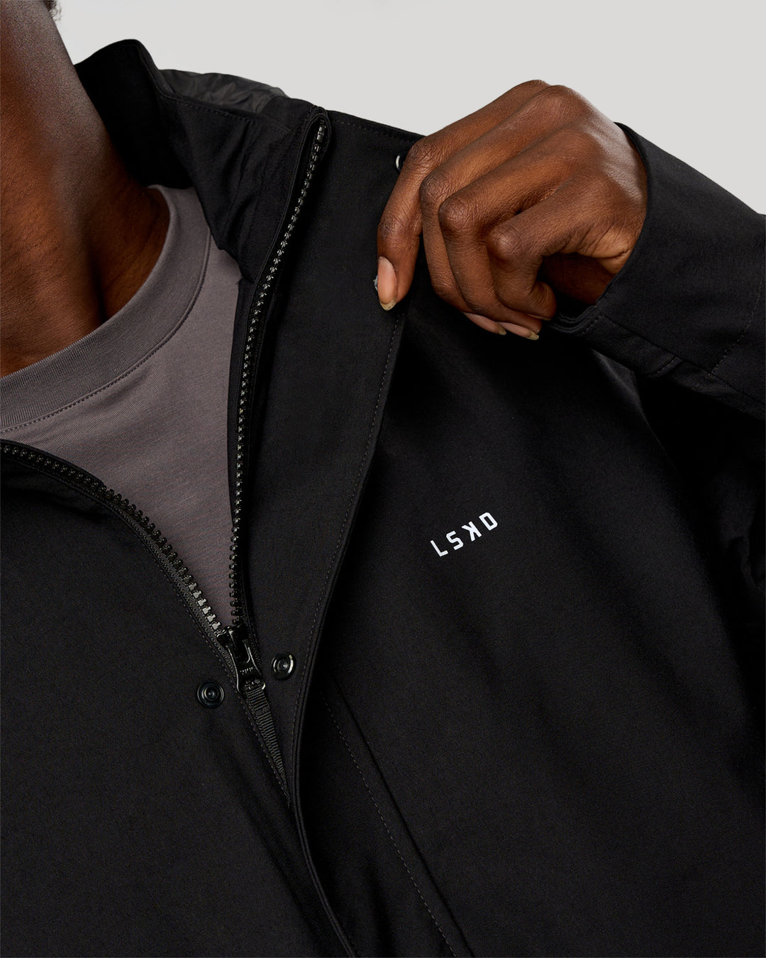 Man wearing Coaches Jacket - Black | Model:Okello | Size:L