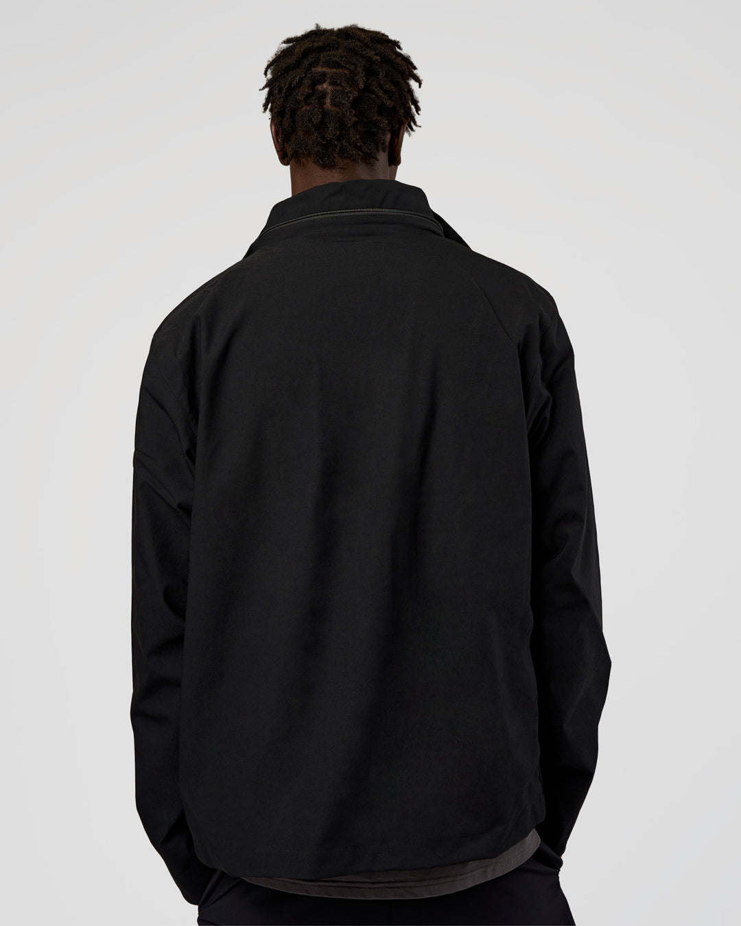 Man wearing Coaches Jacket - Black | Model:Okello | Size:L
