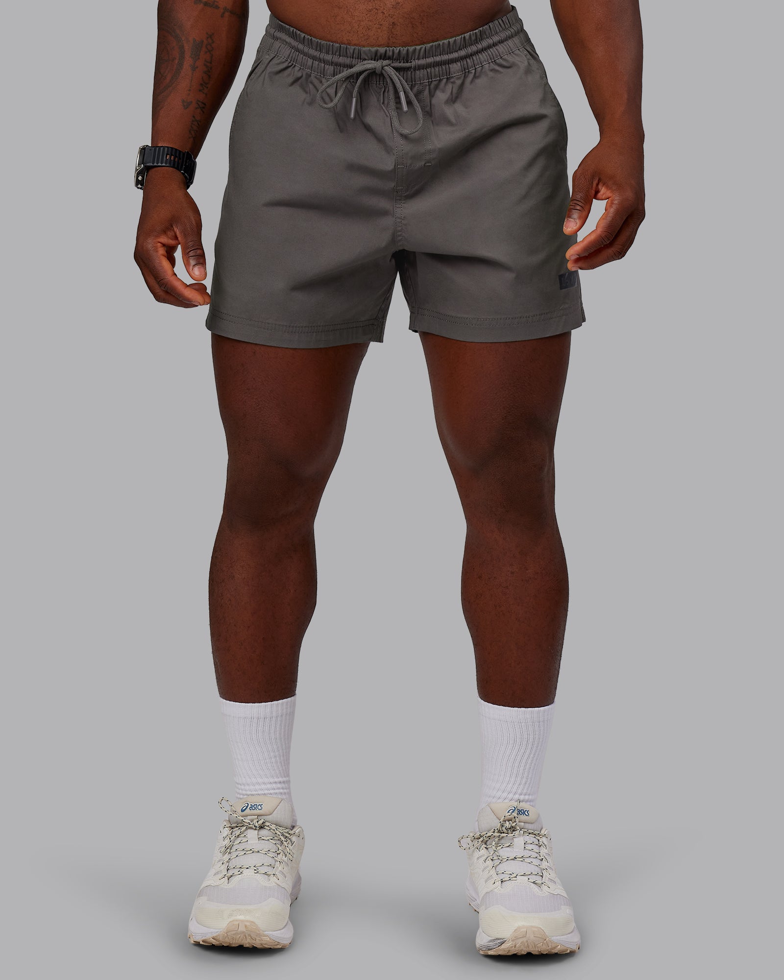 Man wearing Daily 5" Short - Dark Storm | Model:Sam | Size:L