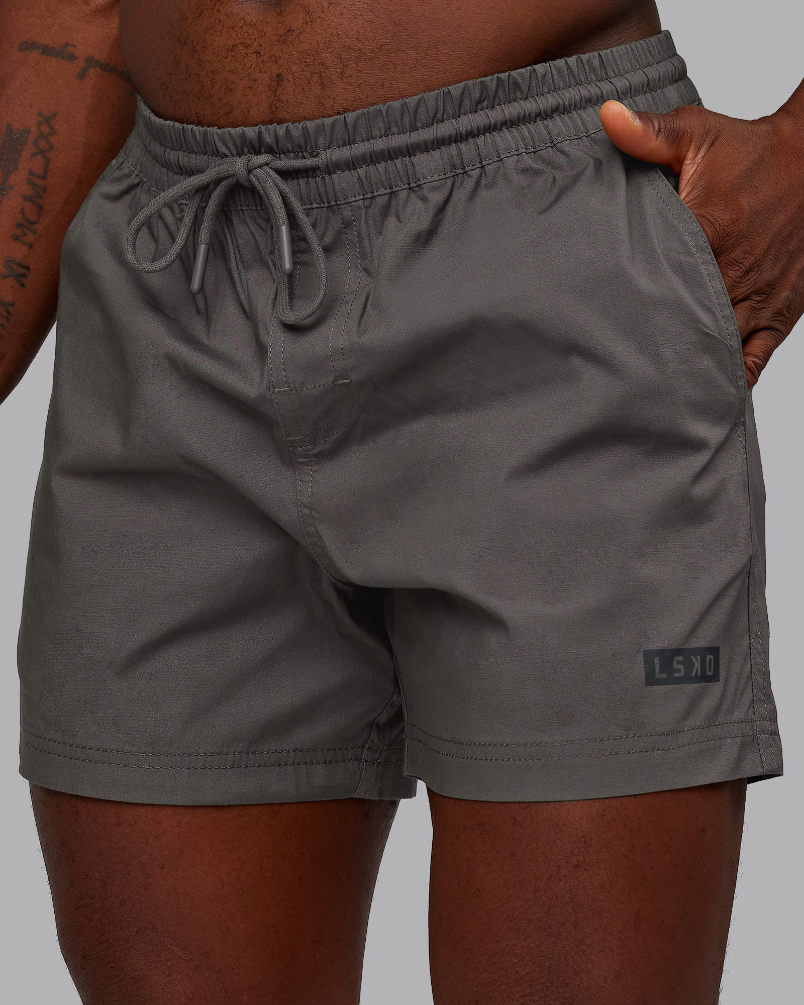 Man wearing Daily 5" Short - Dark Storm | Model:Sam | Size:L