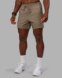 Man wearing Daily 5" Short - Greige | Model:Sam | Size:L