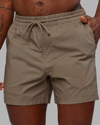 Man wearing Daily 5" Short - Greige | Model:Sam | Size:L