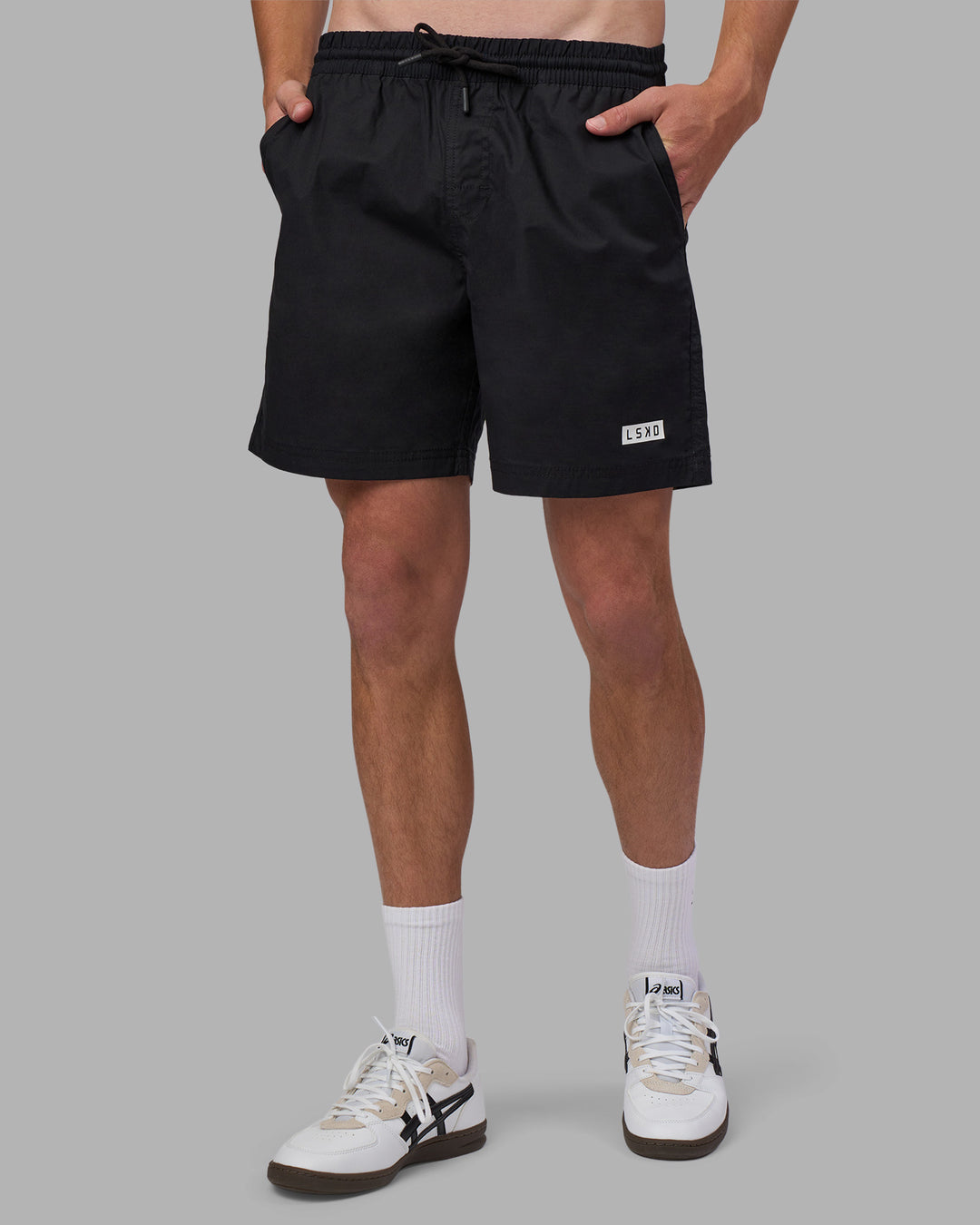 Man wearing Daily 7" Short - Black-White | Model:Brandon | Size:L