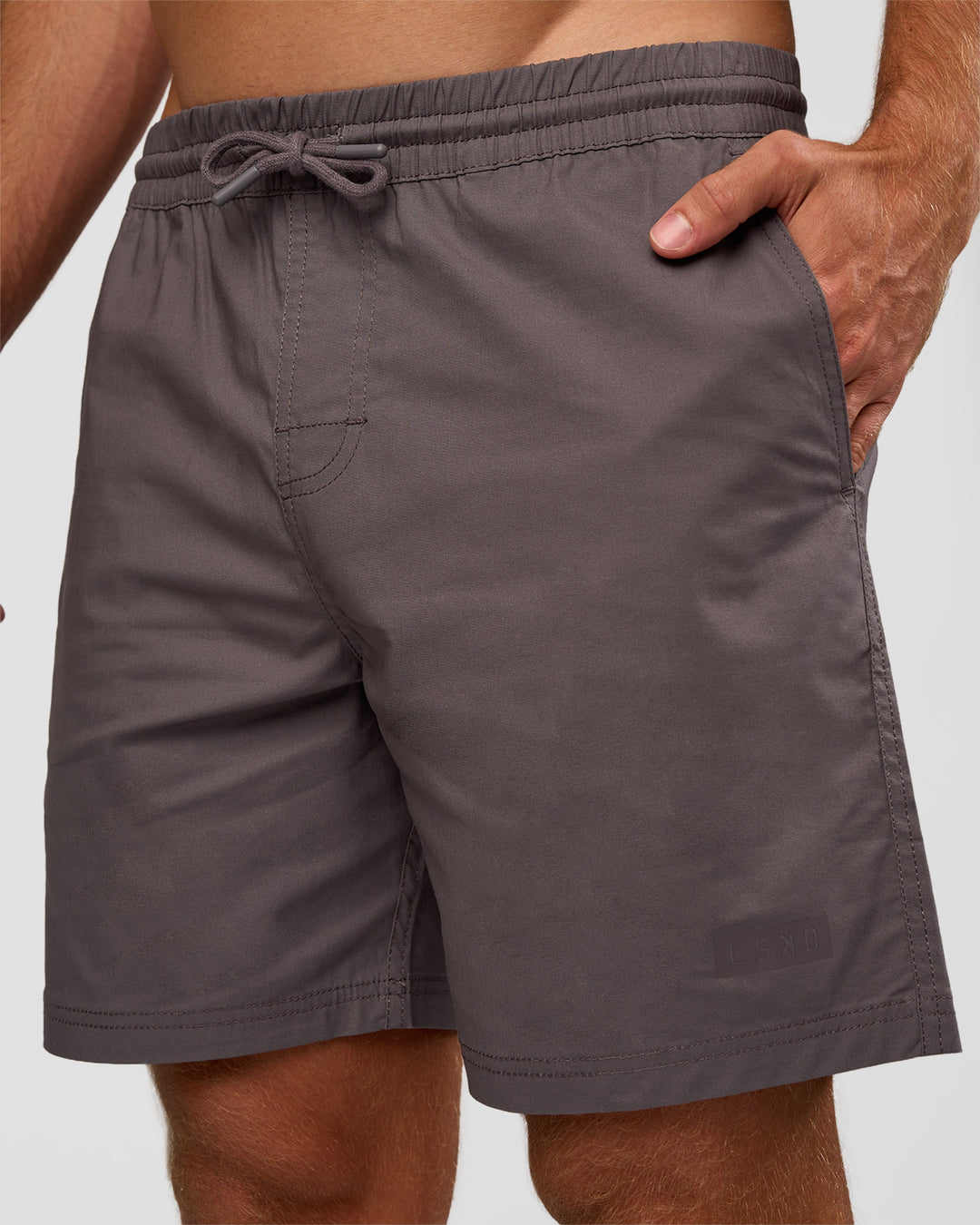 Man wearing Daily 7" Short - Duskstone | Model:Marcus | Size:L