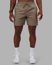 Man wearing Daily 7" Short - Greige | Model:Sam | Size:L | Thumbnail Index: 0