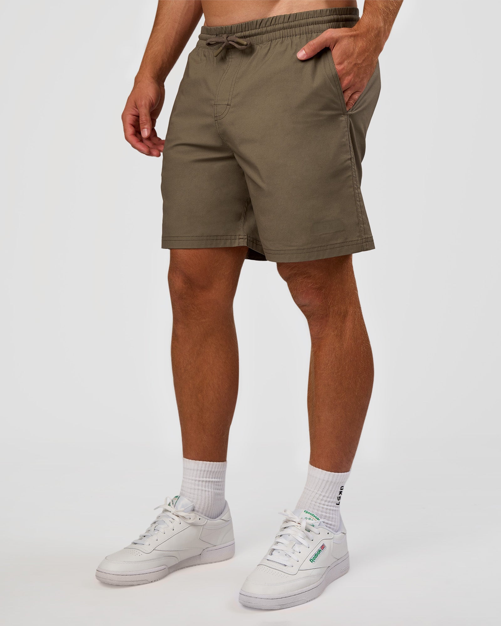 Man wearing Daily 7" Short - Walnut Grey | Model:Marcus | Size:L