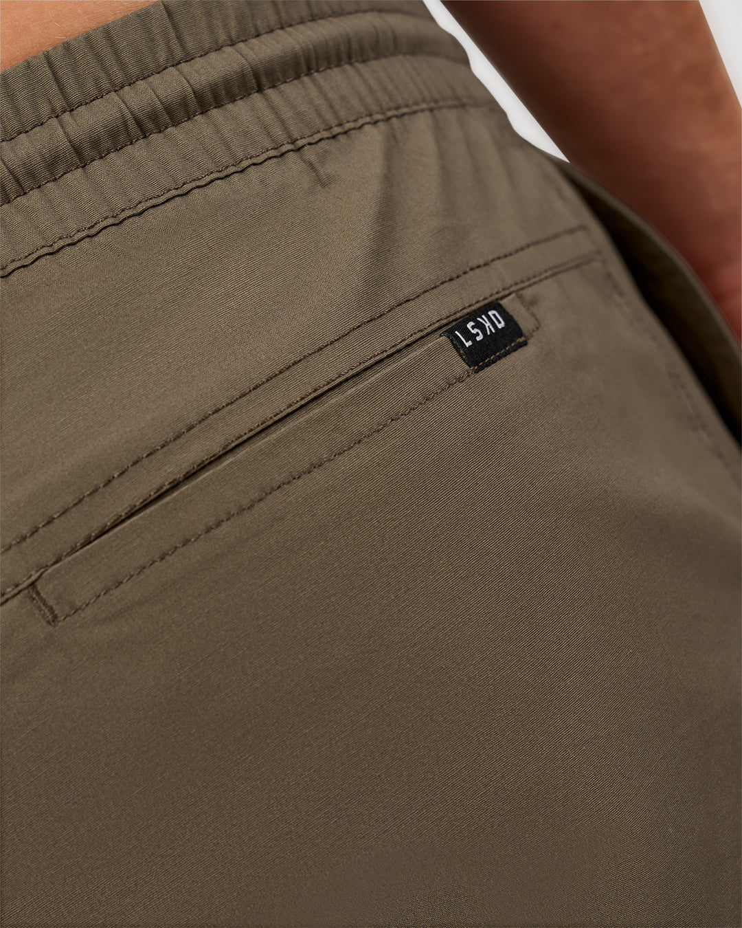 Man wearing Daily 7" Short - Walnut Grey | Model:Marcus | Size:L