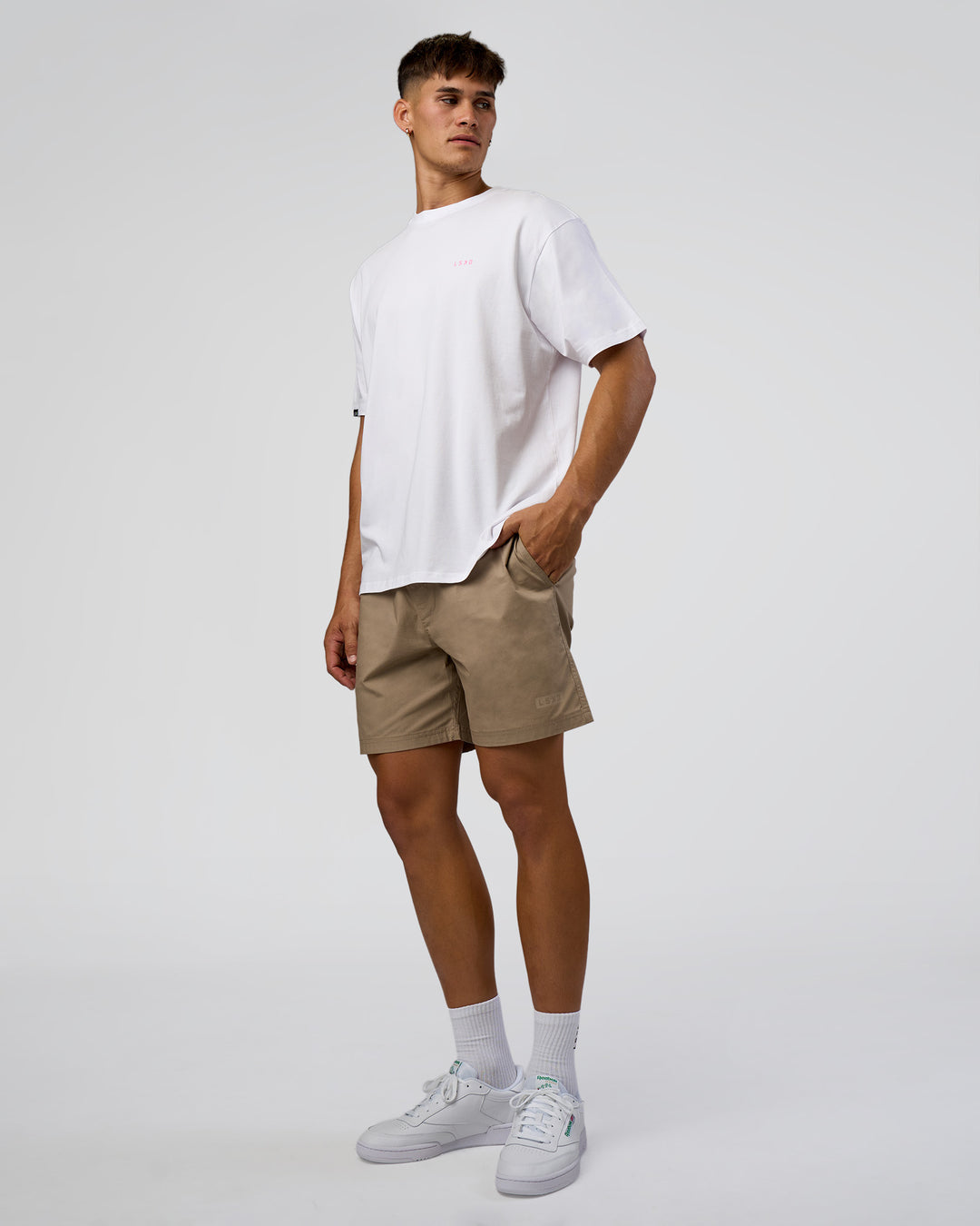 Man wearing Dare To Think FLXCotton Tee Oversize - White-Candy Pink | Model:Jackson | Size:L