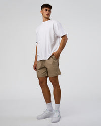 Man wearing Dare To Think FLXCotton Tee Oversize - White-Candy Pink | Model:Jackson | Size:L