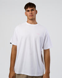 Man wearing Dare To Think FLXCotton Tee Oversize - White-Candy Pink | Model:Jackson | Size:L