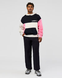 Man wearing Deconstructed Fleece Hoodie - Caviar-Candy Pink-Grey Marl | Model:Xav | Size:L