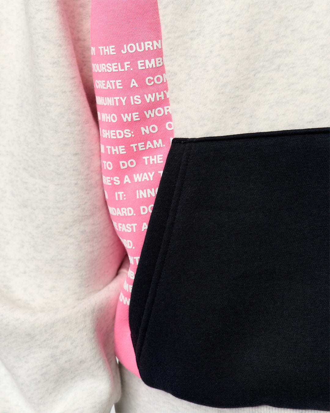 Man wearing Deconstructed Fleece Hoodie - Caviar-Candy Pink-Grey Marl | Model:Xav | Size:L